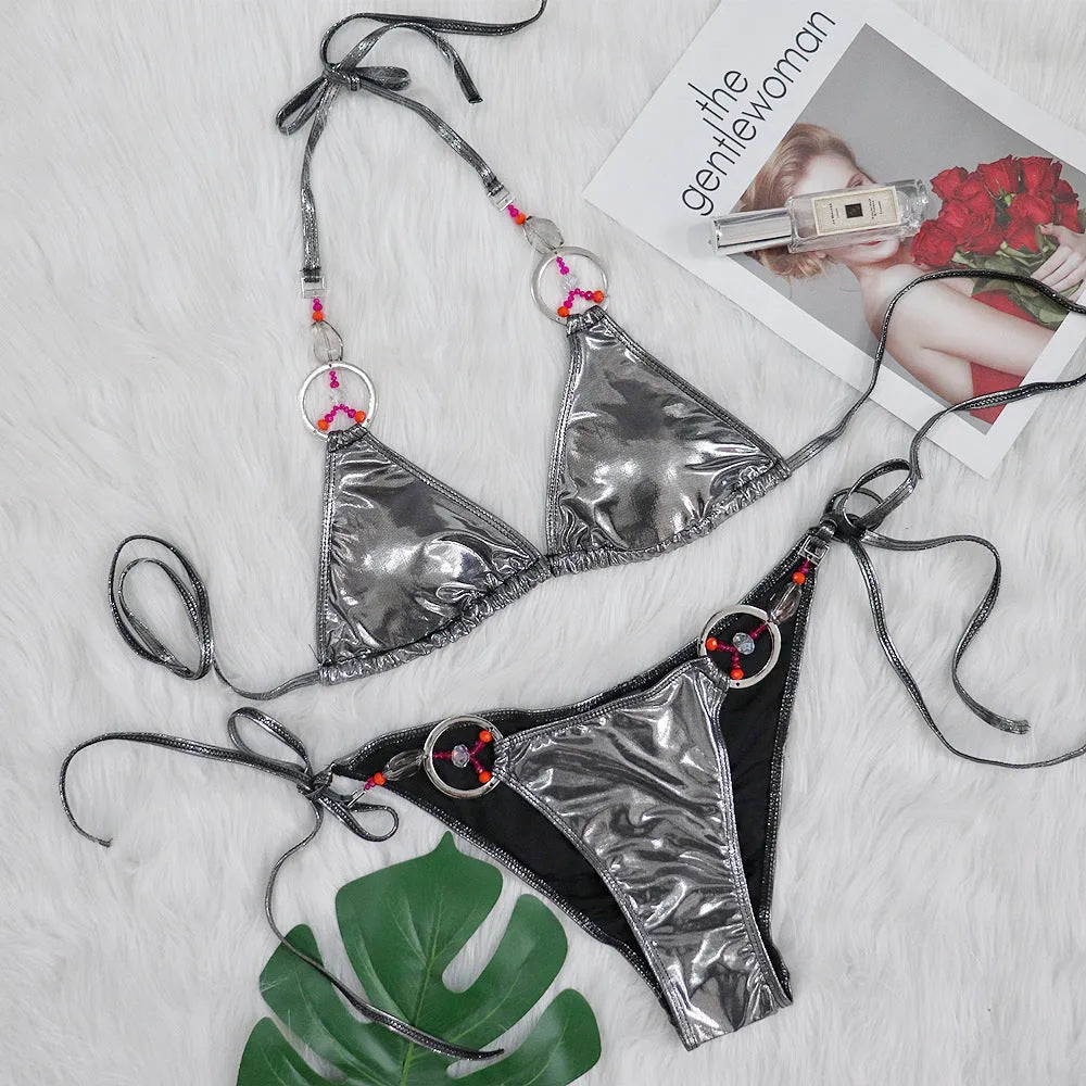 Silver women's bikini swimsuit with split-style briefs on mannequin