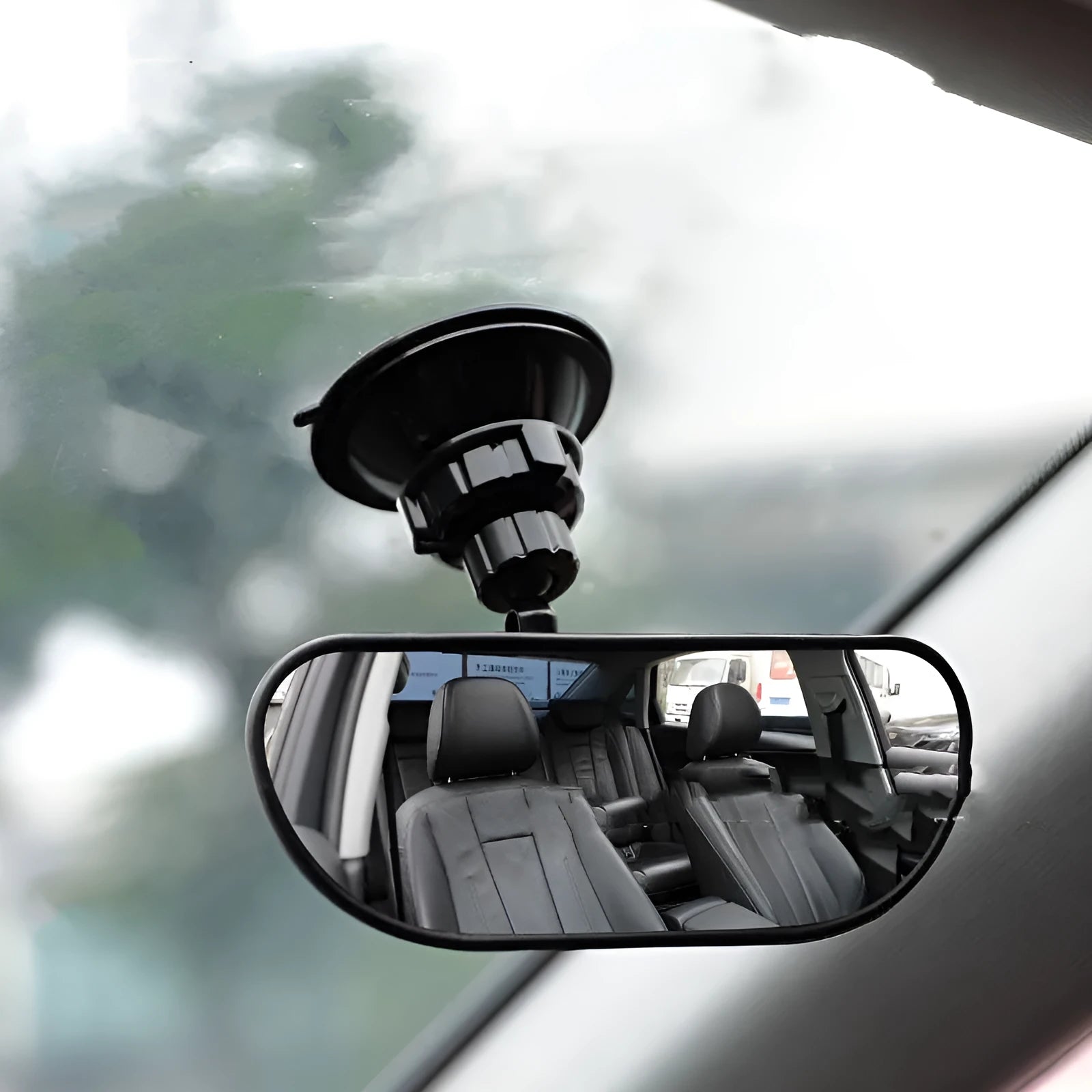 Black 360-degree rotating rearview mirror for car with suction cup mount on a windscreen.