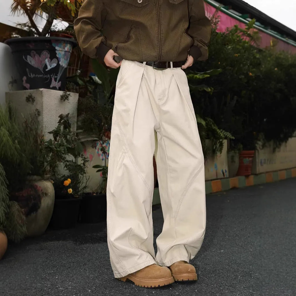 Men's pleated straight-leg trousers in striped pattern with micro-elasticity, available in apricot, black, and brown colours.