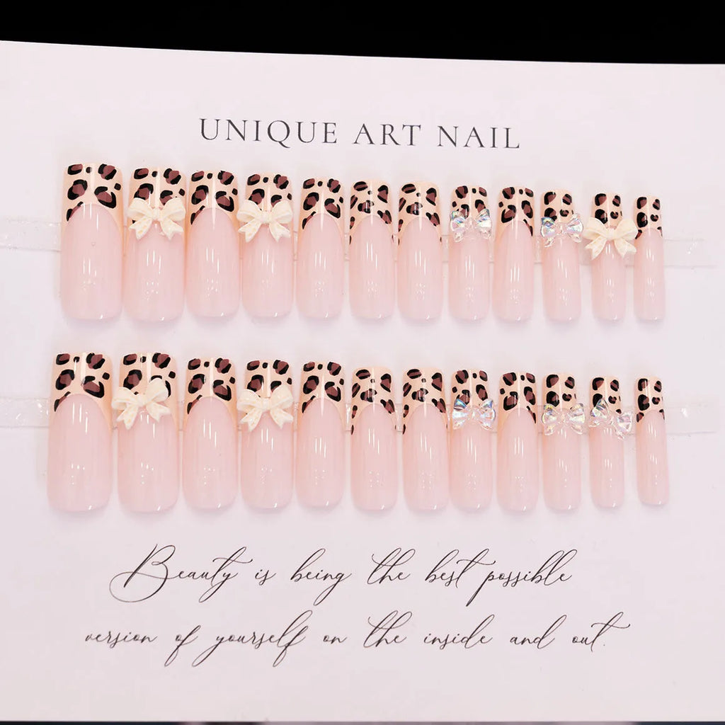 Leopard print butterfly nail art pieces with dimensional plastic construction in WM296 colour pattern