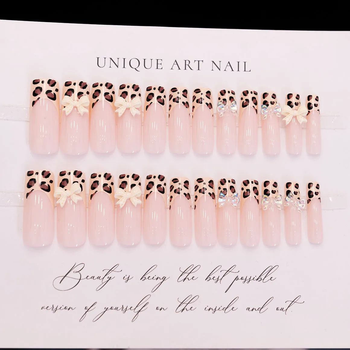 Leopard print butterfly nail art pieces with dimensional plastic construction in WM296 colour pattern