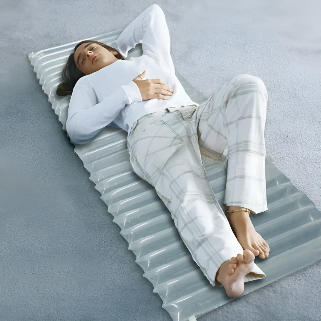 Transparent inflatable camping airbed showing dimensions and sturdy construction.