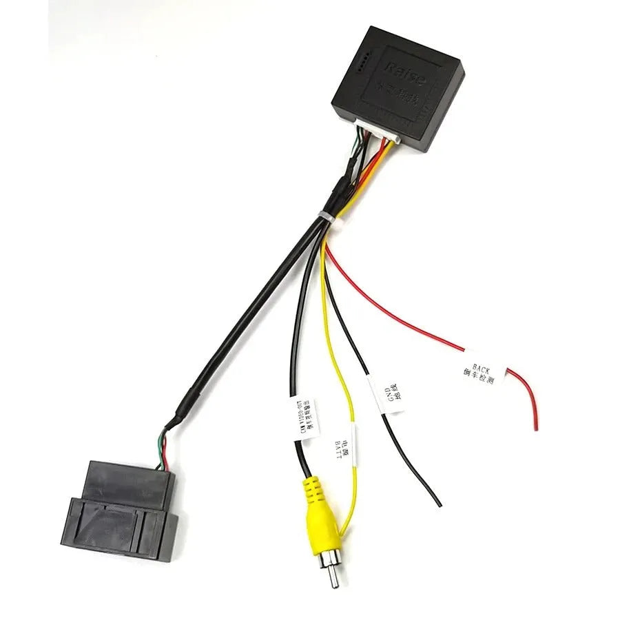 Black original car camera conversion box for Volkswagen and Skoda MIB hosts.
