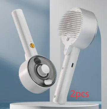 Ceramic white pet grooming comb with soft needles, UVC blue light, and a mist spray nozzle.