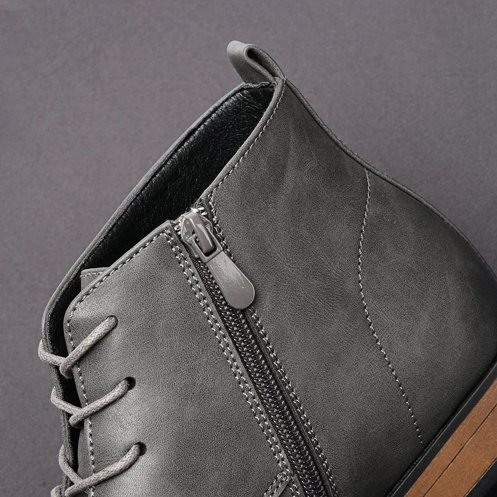 Men's plus size brown Chelsea ankle boot with a side zip, round toe, and low wooden sole.