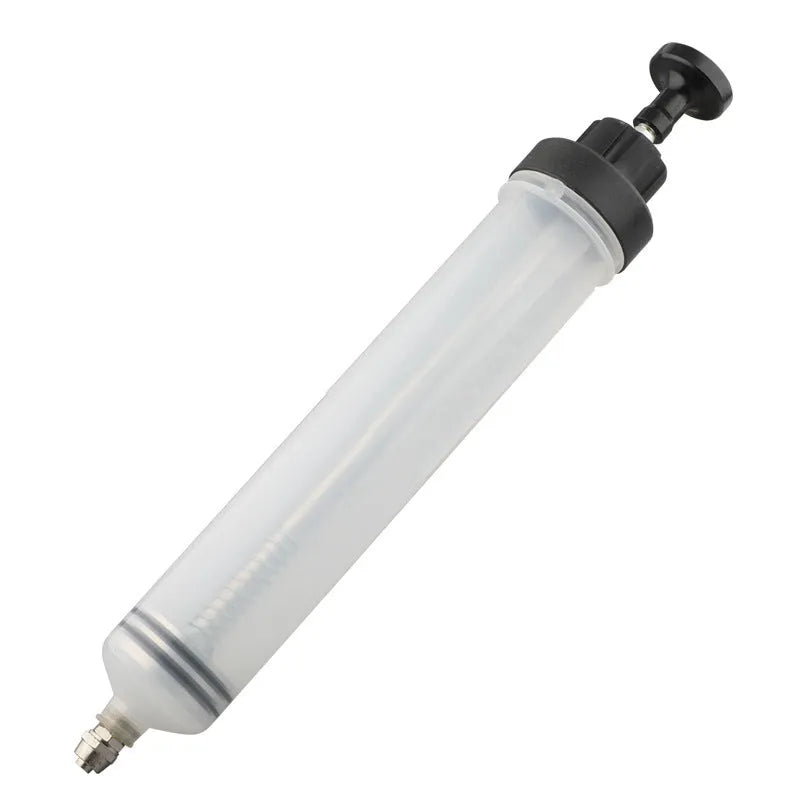 Manual oil change pump tool with syringe design for suction and injection of fluids