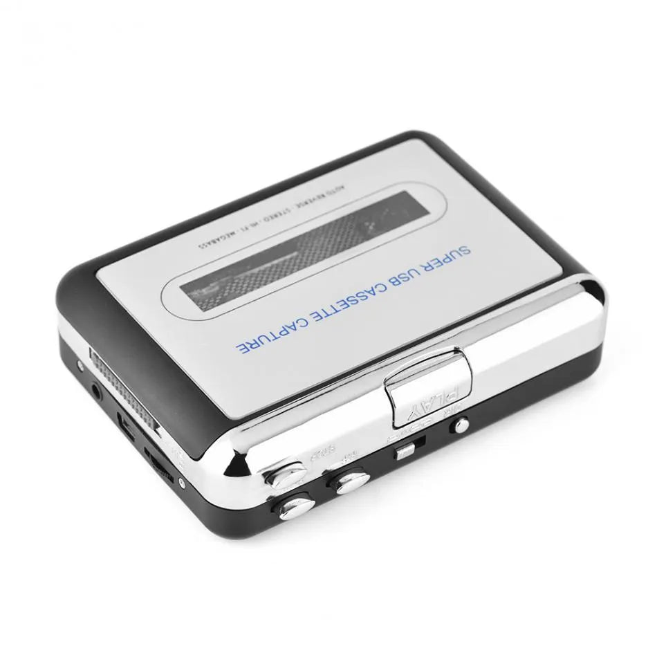 Silver USB cassette tape to MP3 converter unit with connection cables on a flat surface.
