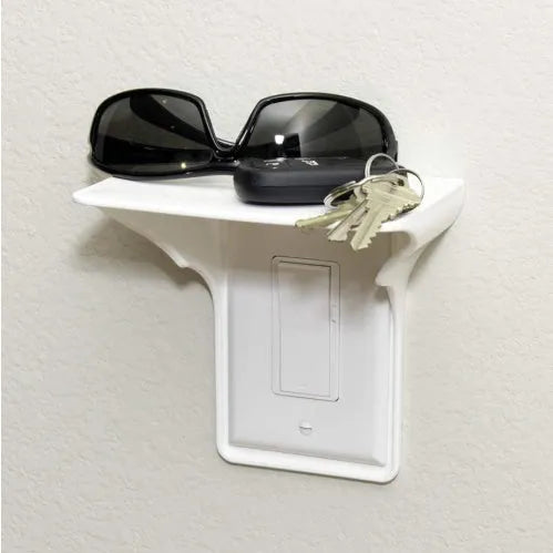 White PP socket rack organiser measuring 14cm by 10cm by 15cm on a workbench
