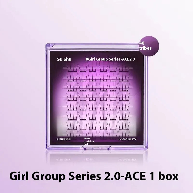 Pack of reusable false eyelash clusters made from black artificial fibre on a clear plastic tray.