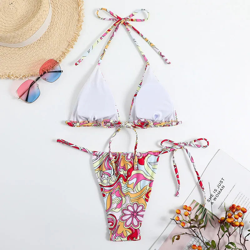 Women's triangle print bikini with hanging neck top and separate system design in multicolour