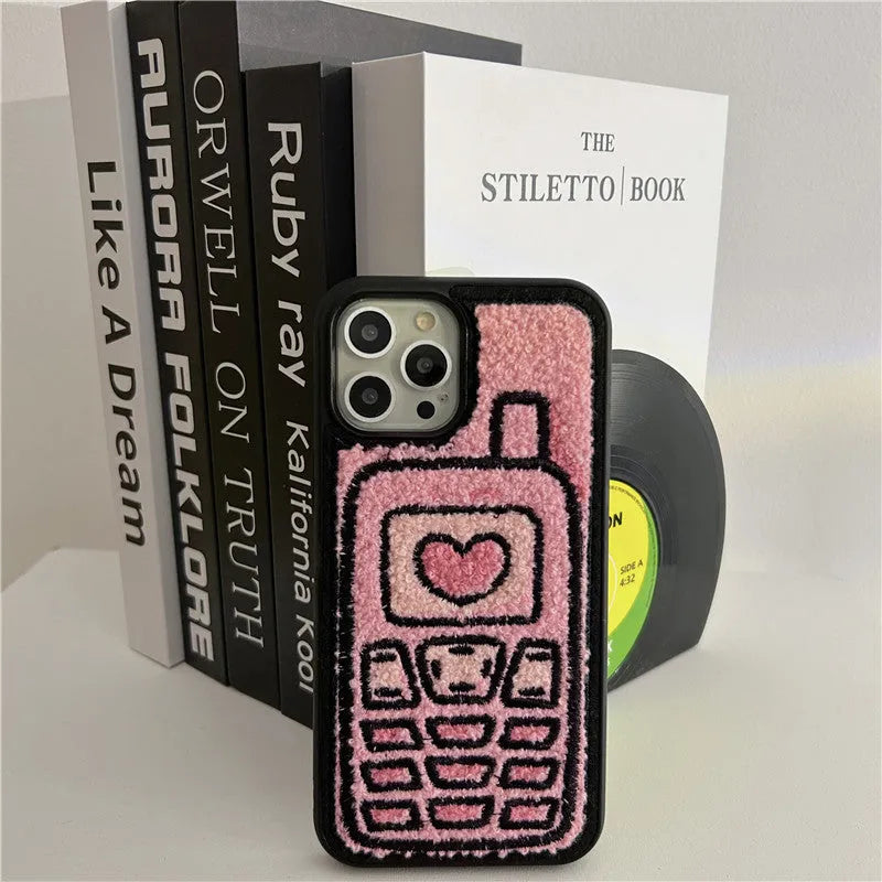 Pink TPU iPhone back cover case with a textured towel embroidery design.