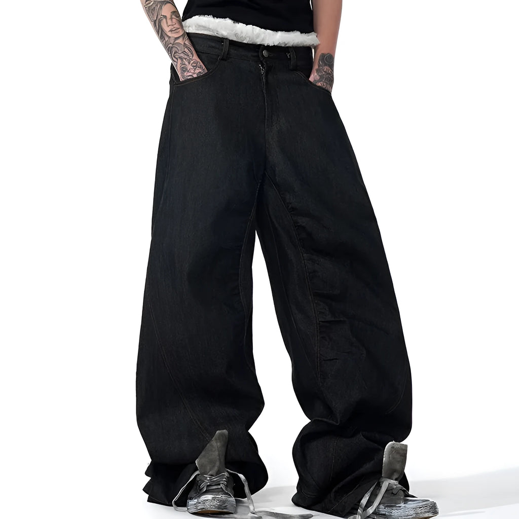 Black wide-leg women's jeans with colour-changing embroidery, shown in a loose straight fit.
