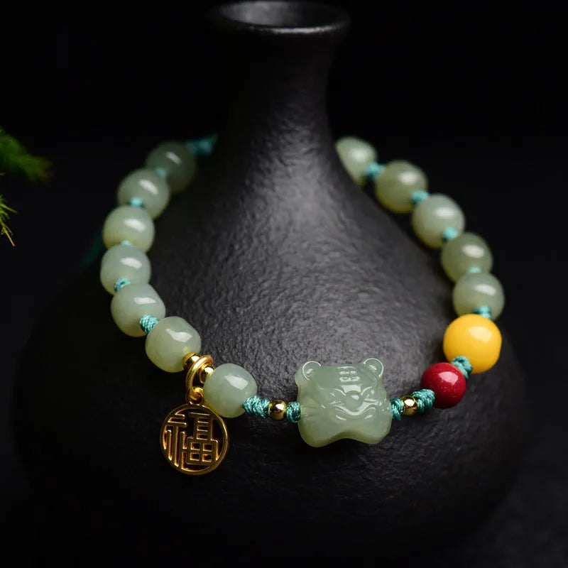 Natural Hetian Jade bracelet with animal Zodiac modelling and unset Cinnabar Beeswax beads.