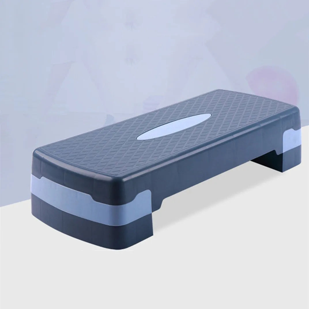 Grey Fit Step aerobics platform measuring 68x28x15cm with non-slip ABS surface for home workouts