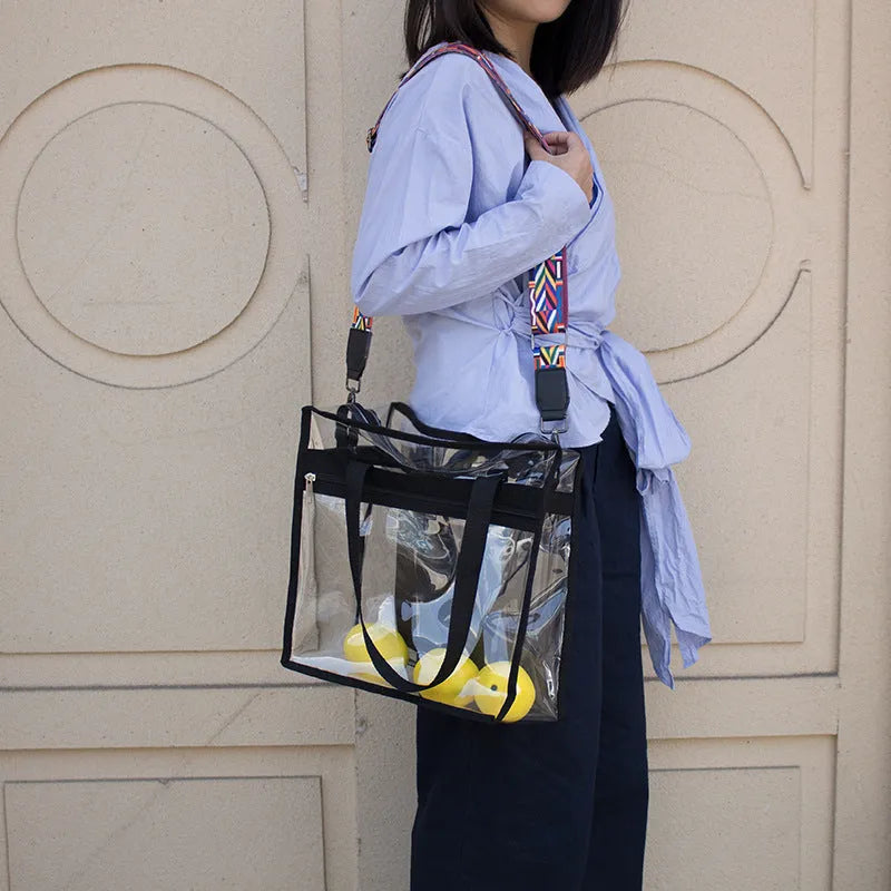 Women's transparent front PVC shoulder messenger bag in navy blue with adjustable straps