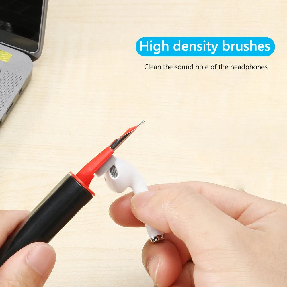 White and red cleaning pen for AirPods Pro with multiple heads including a brush and metal nib.