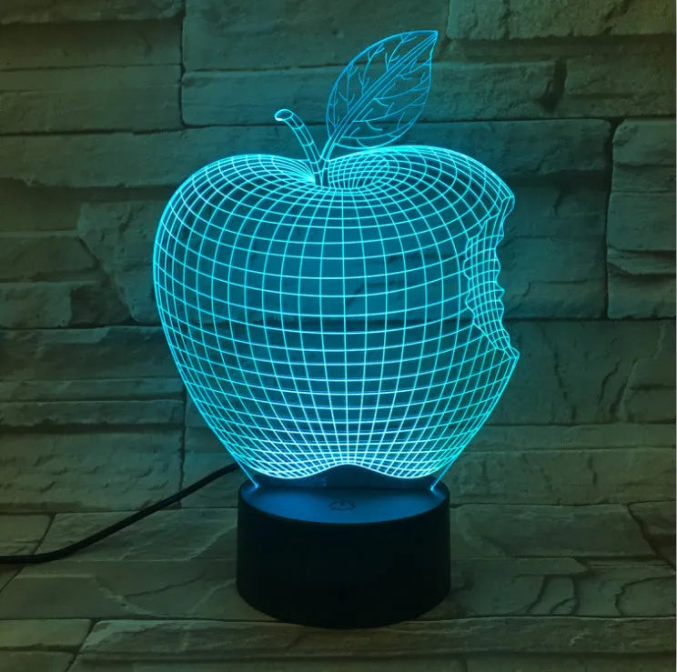 3D fruit colourful night light with touch control, acrylic shade, and seven LED colour options on a table
