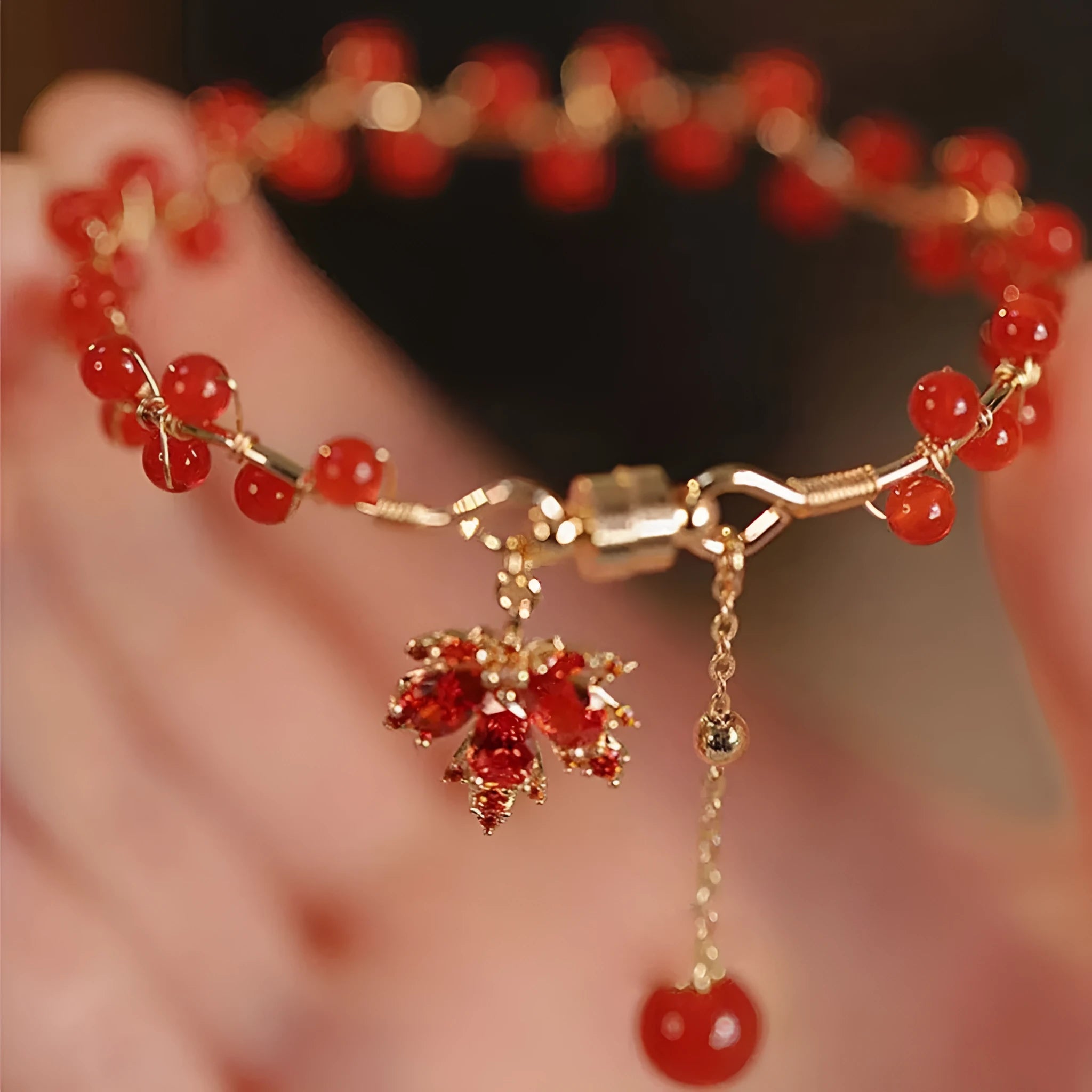 Red electroplated alloy bracelet with Chinese style maple leaf design and magnetic closure for girls