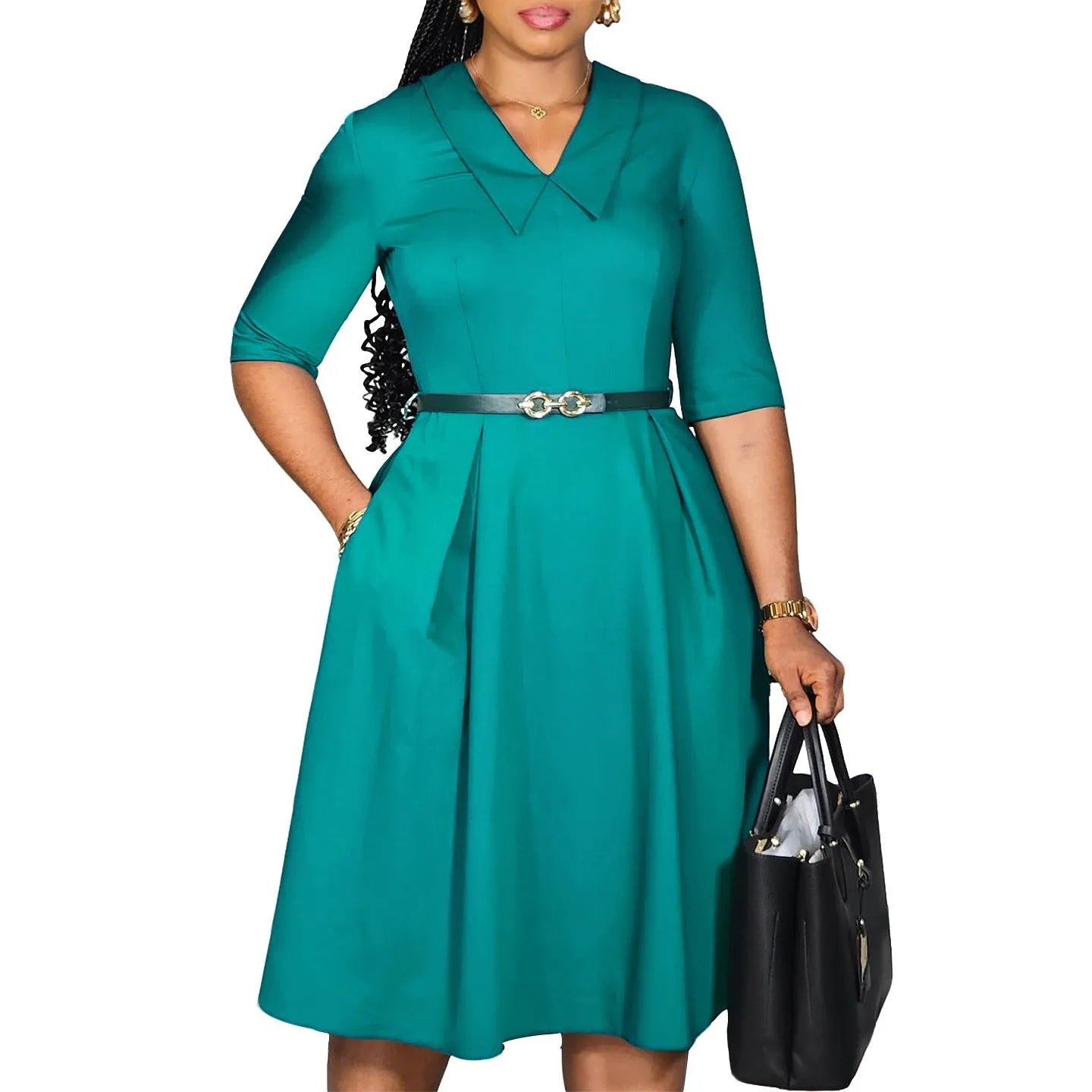 Women's solid colour African dress with high waist, half sleeves, and a matching belt.