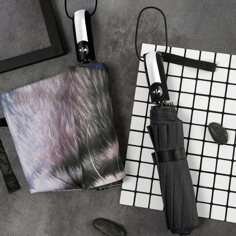Tri-fold folding umbrella with iron frame shown in street style design with manual opening mechanism