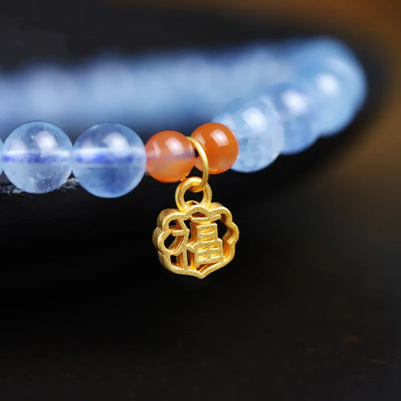 Ice transparent aquamarine crystal bead bracelet with 8mm round beads and sequin detailing