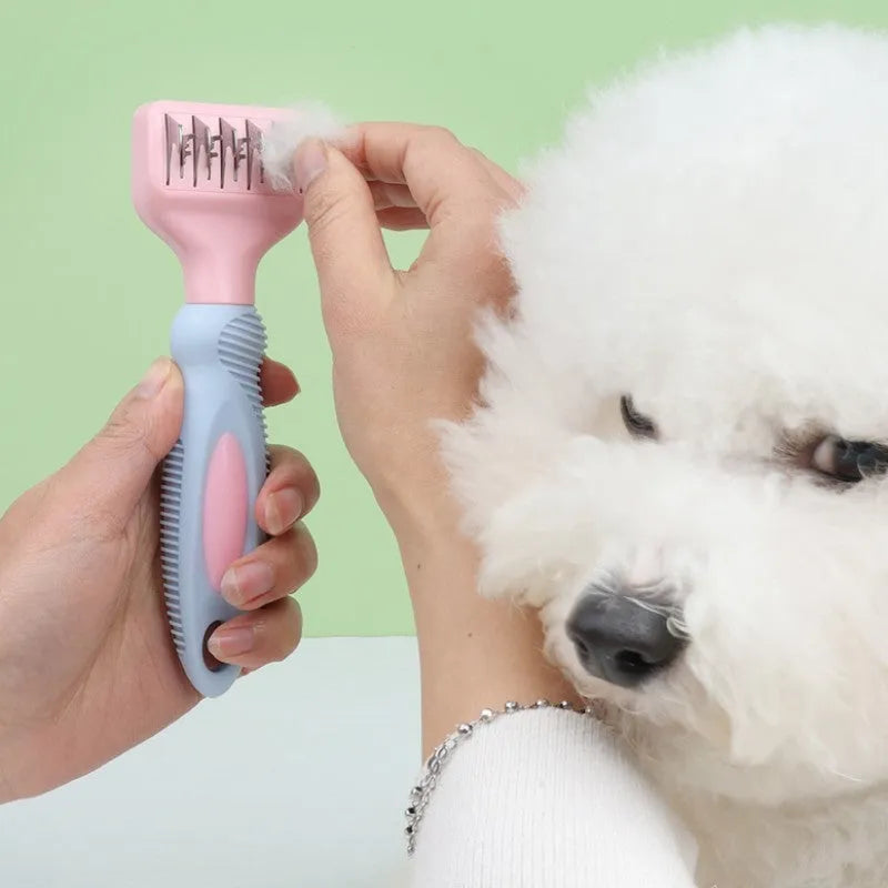 Stainless steel dog comb with knot knife measuring 170mm, available in pink or purple colours for pet grooming
