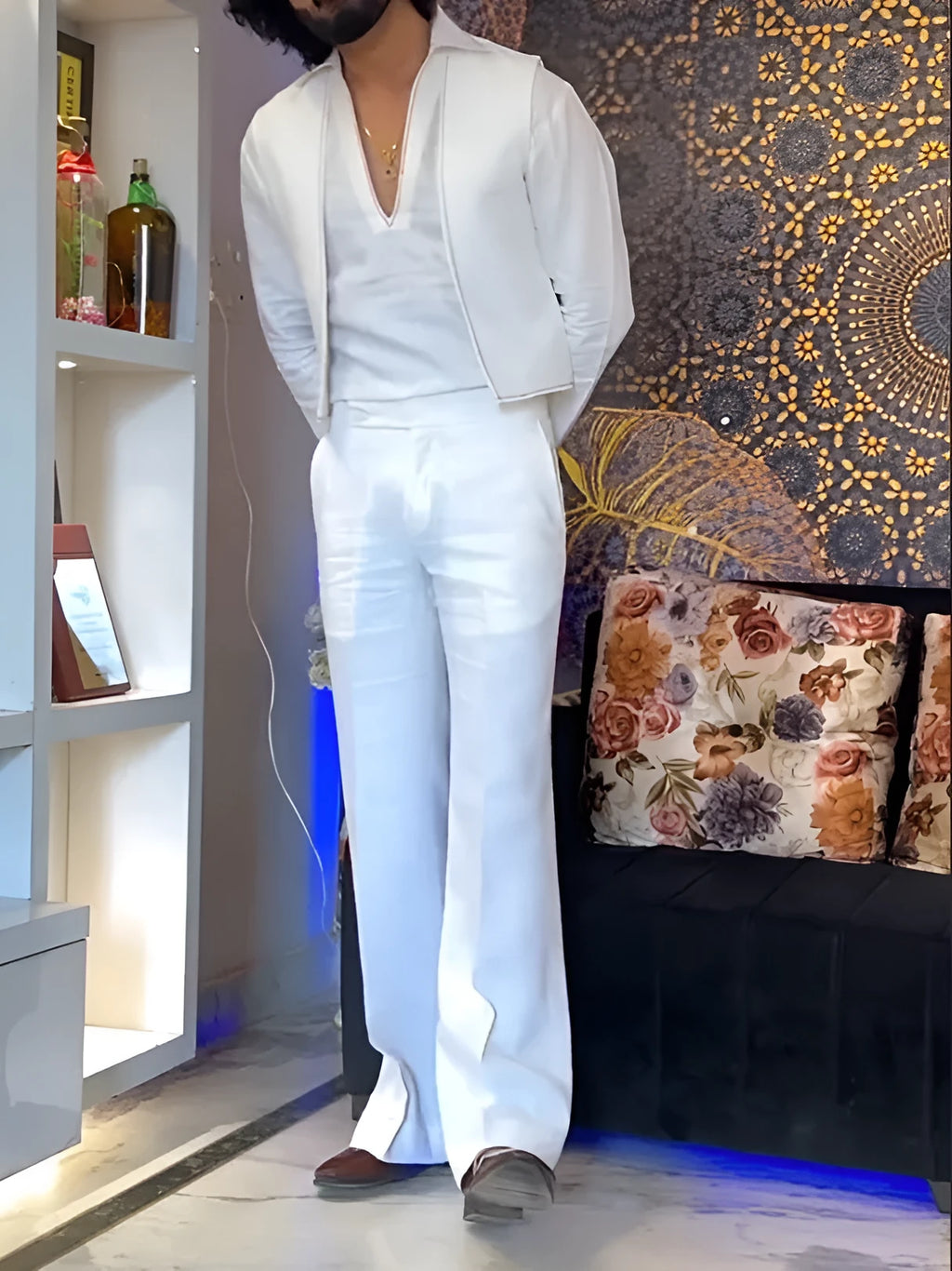 White polyester three-piece outfit with V-neck shirt, sleeveless vest, and regular-fit trousers.