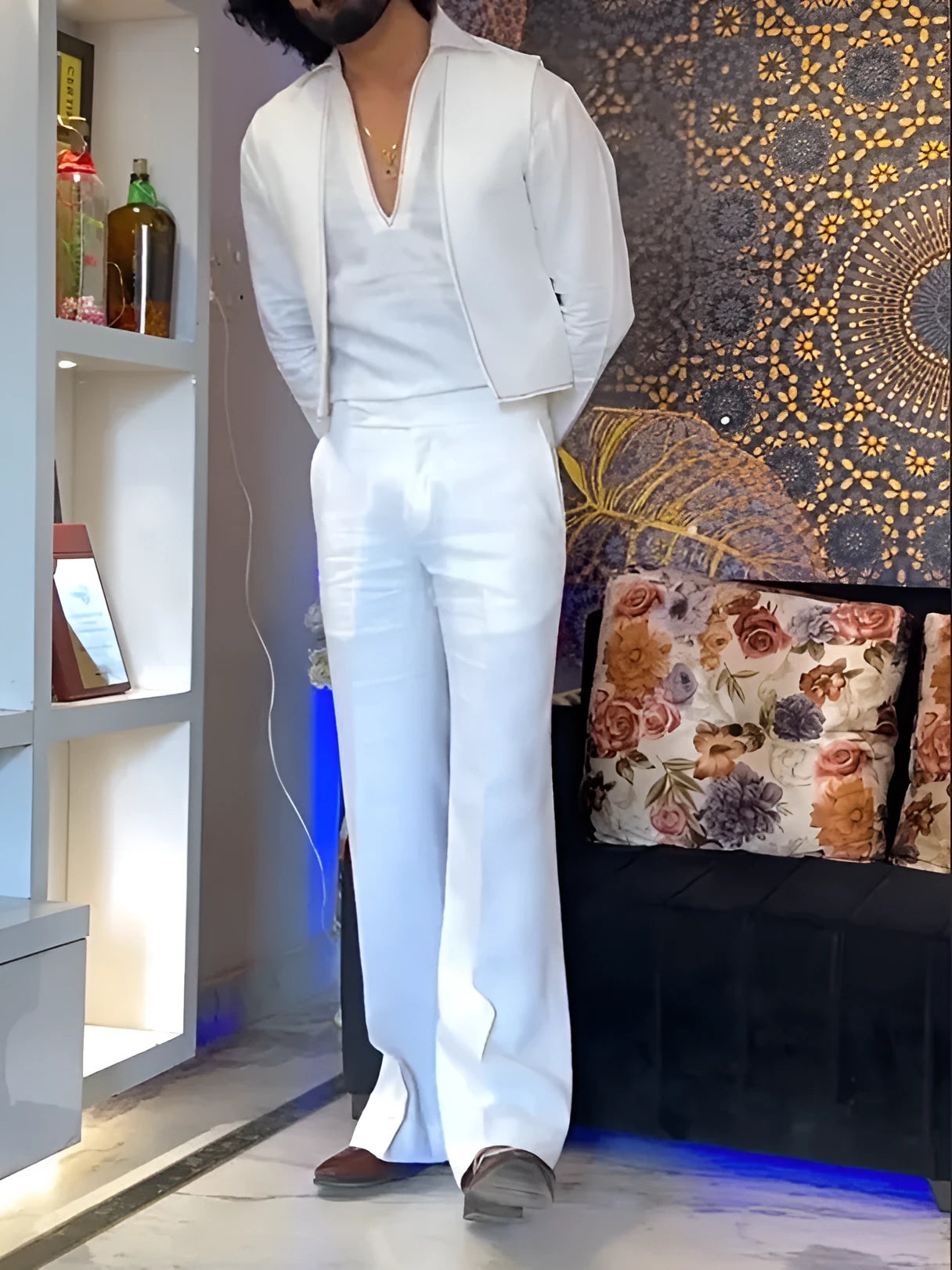 White polyester three-piece outfit with V-neck shirt, sleeveless vest, and regular-fit trousers.