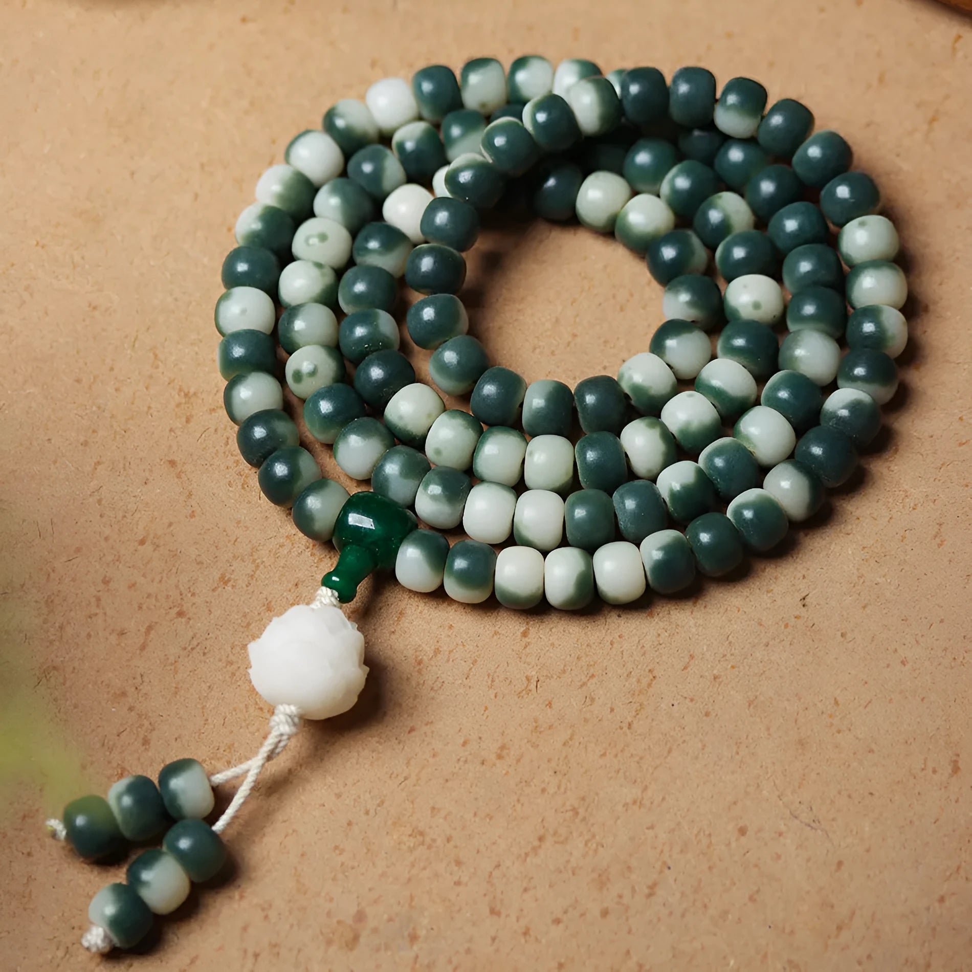 Lotus white jade bodhi beads bracelet with carved floral patterns on 8mm jade beads