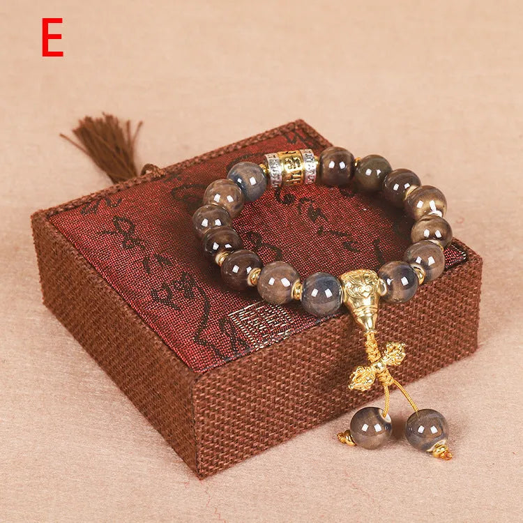Men's gradient ceramic chain bracelet in coloured glaze, polished finish, showing colour variation.