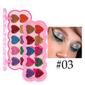 Pearlescent heart-shaped eye shadow palette with ten colours including sequins for punk and festival make-up.