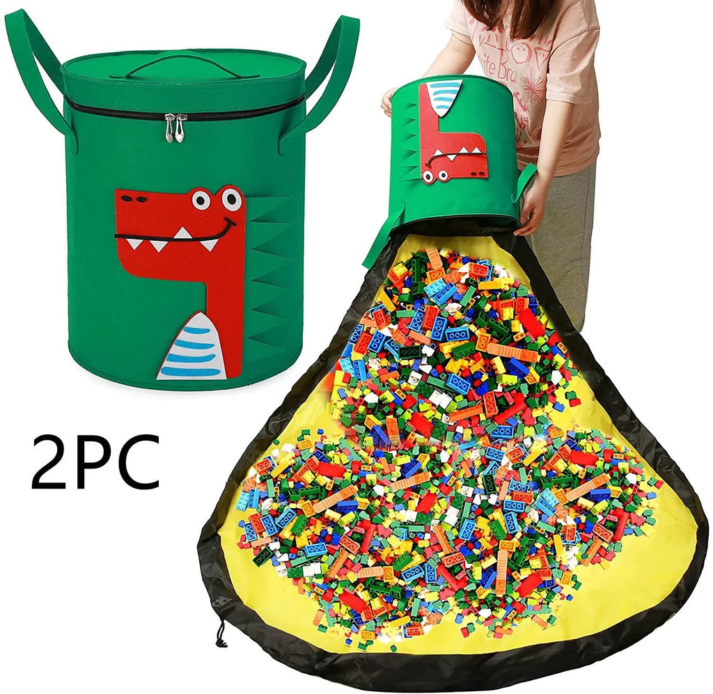 Green felt storage cube with pull rope, unfolded as a play mat on a living room floor