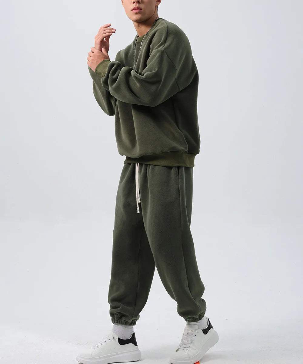 Men's black fleece sports suit with crew neck coat and loose fit trousers for winter wear