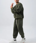 Men's black fleece sports suit with crew neck coat and loose fit trousers for winter wear