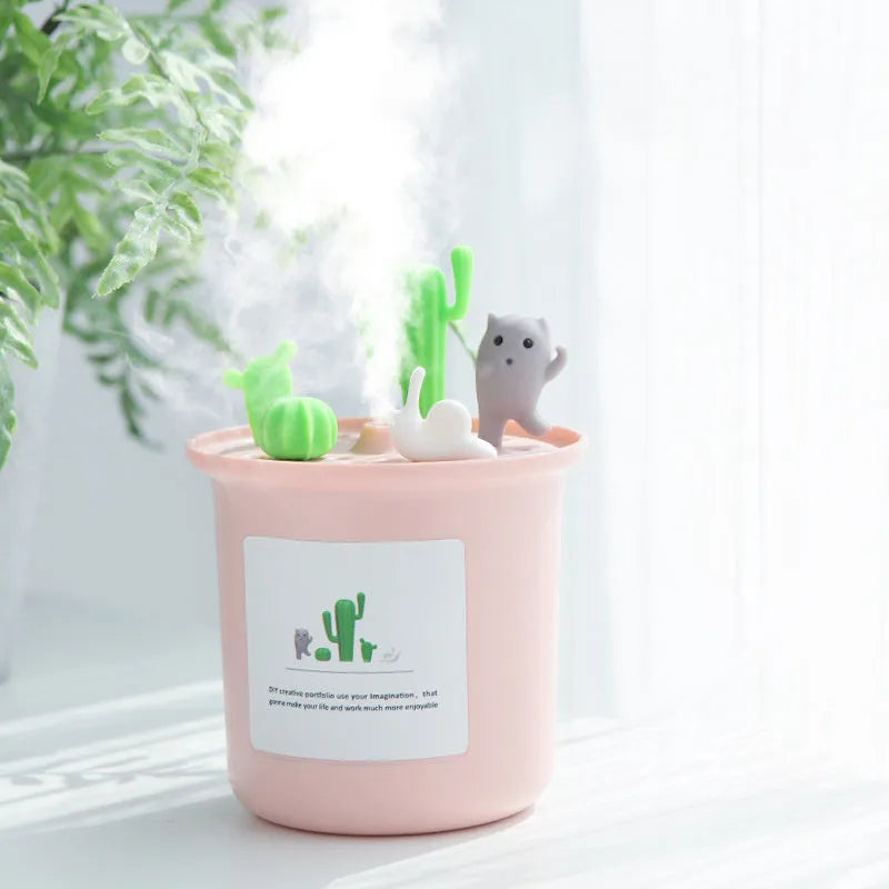 Vase-shaped pet humidifier in grey, pink, or white with mechanical dials and a water tank.