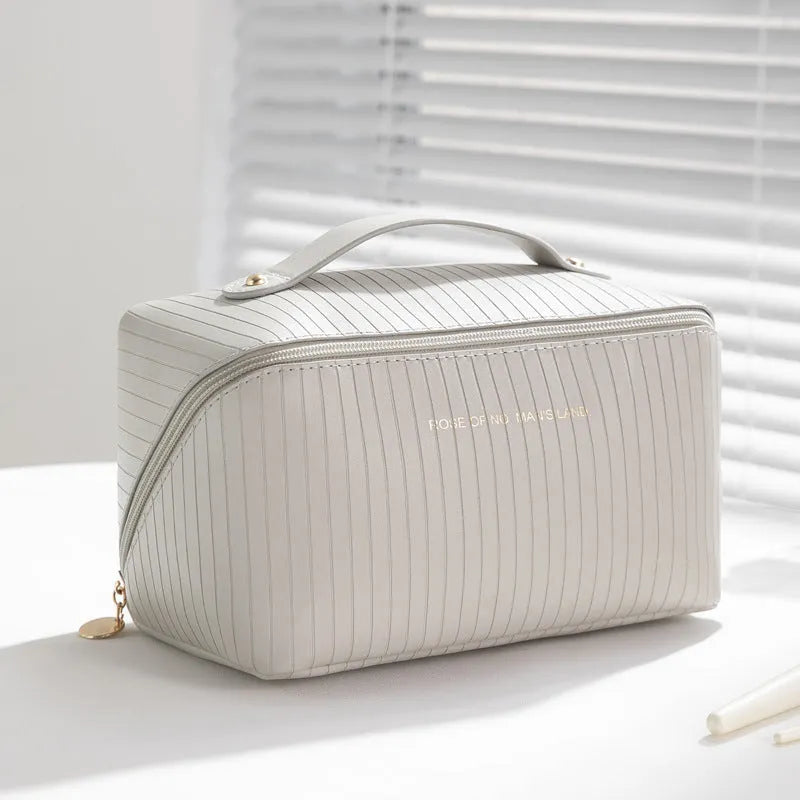 Vertical pattern cubic makeup bag in beige, black, brown, grey, or pink with 22.5cm dimensions