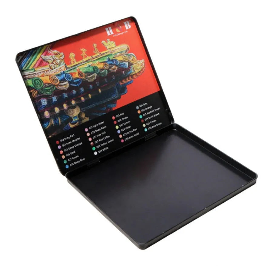 Metal tin box open to show 24 water-soluble coloured pencils in wooden casings.