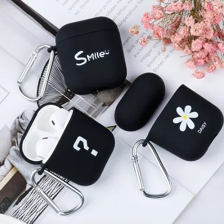 Wireless headset cover for Apple AirPods in black and pink colours with various style designs
