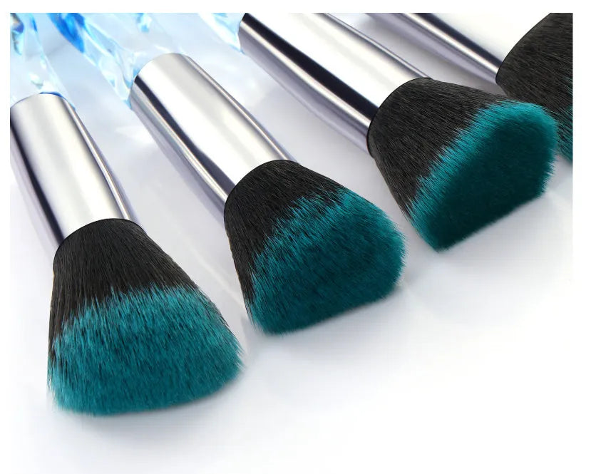 10 clear crystal foundation brushes with diamond shank handles and synthetic bristles arranged in set