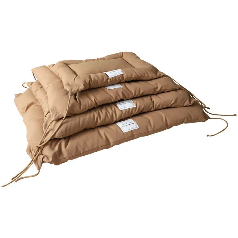 Tied cage cushion for dogs and cats in beige, coffee, or orange colours with four size options
