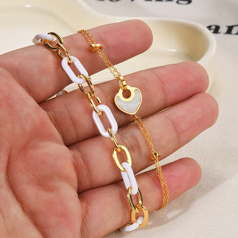 Women's stainless steel resin bracelet with double-layered loving heart design and electroplated finish