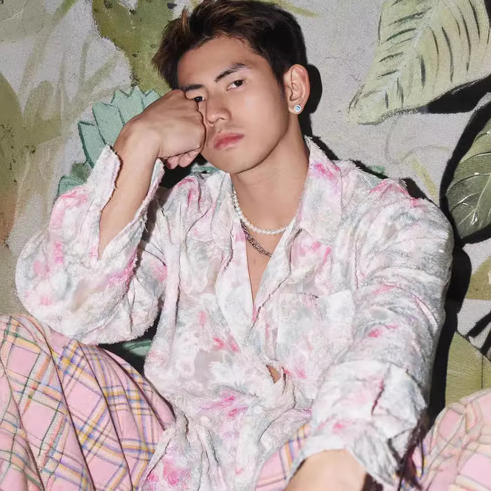 Men's pink floral long-sleeve shirt with embossed texture, loose fit, on hanger