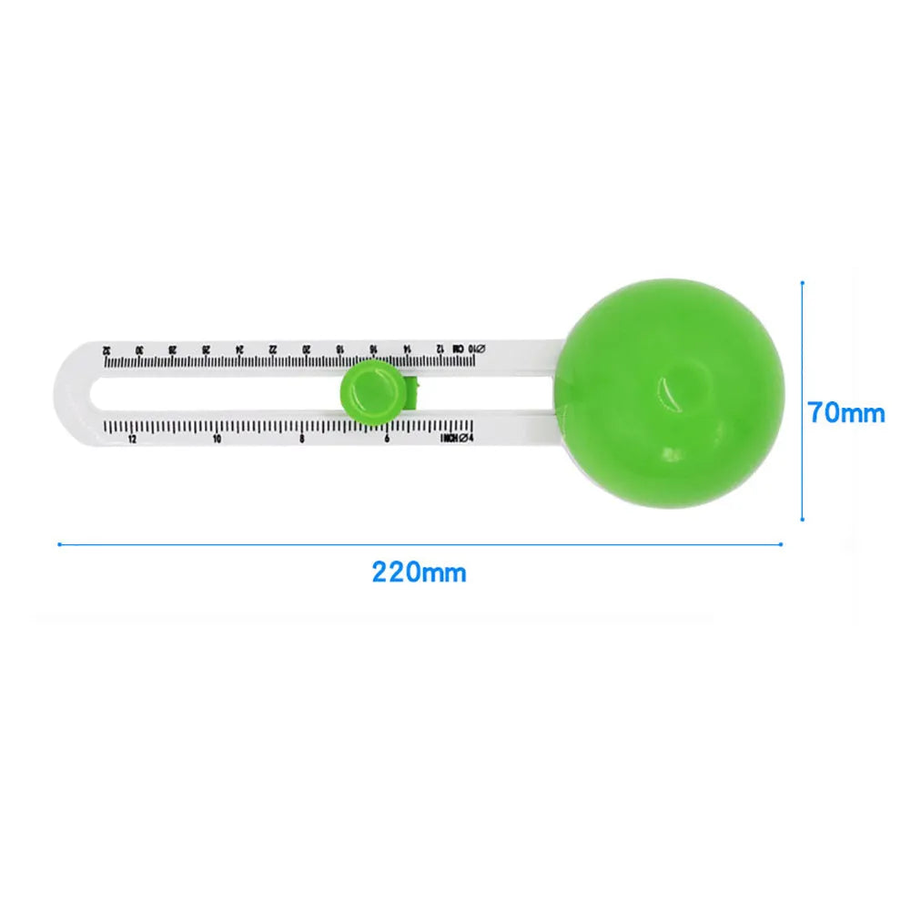 Orange or green plastic round paper cutter on a colour box, capable of cutting A3 paper.