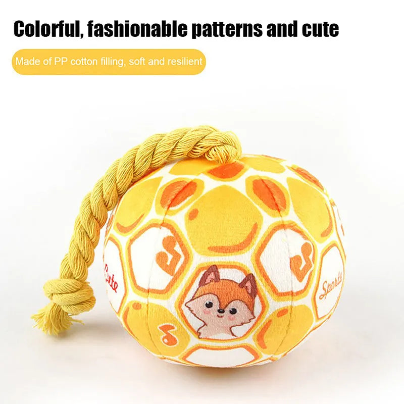 Blue and yellow elastic football dog toy made from cotton rope for tug of war and teeth grinding.
