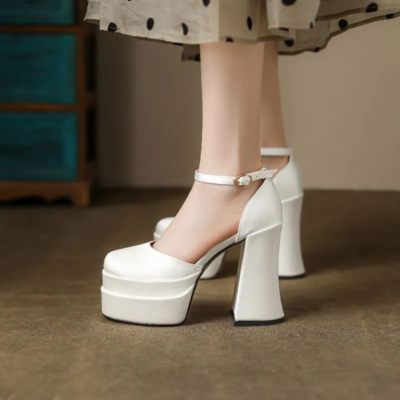 Women's white waterproof platform pumps with a chunky heel and round toe
