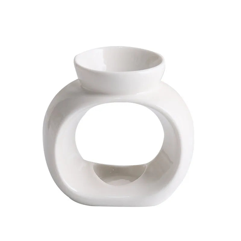 White ceramic aromatherapy stove ornament with Nordic design and anti-dry burning safety feature