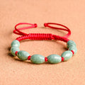 Traditional jade stone bracelet in dark green or red colour with certificate