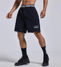 Men's loose black sports shorts with cropped design and elastic waist for workouts