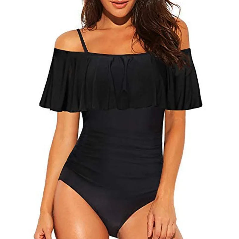 Black one-piece swimsuit with cut-out design and ruffled straps for swimming activities