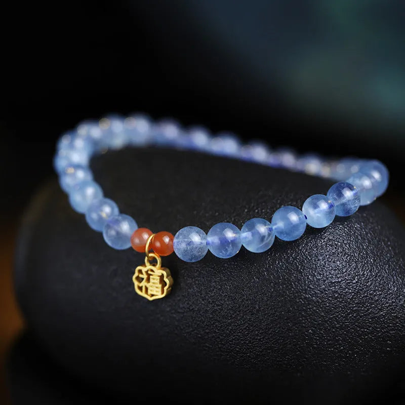 Ice transparent aquamarine crystal bead bracelet with 8mm round beads and sequin detailing